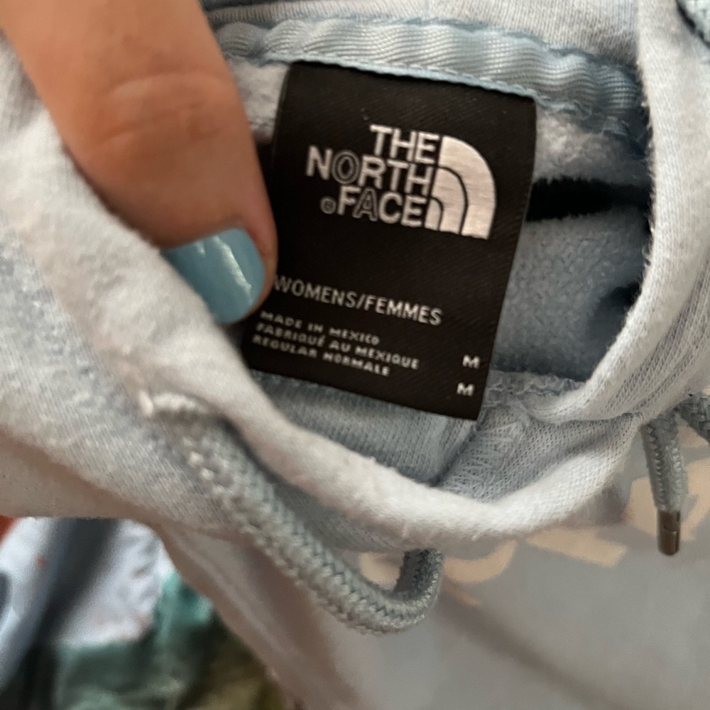 It’s a light blue North Face worn a couple times
